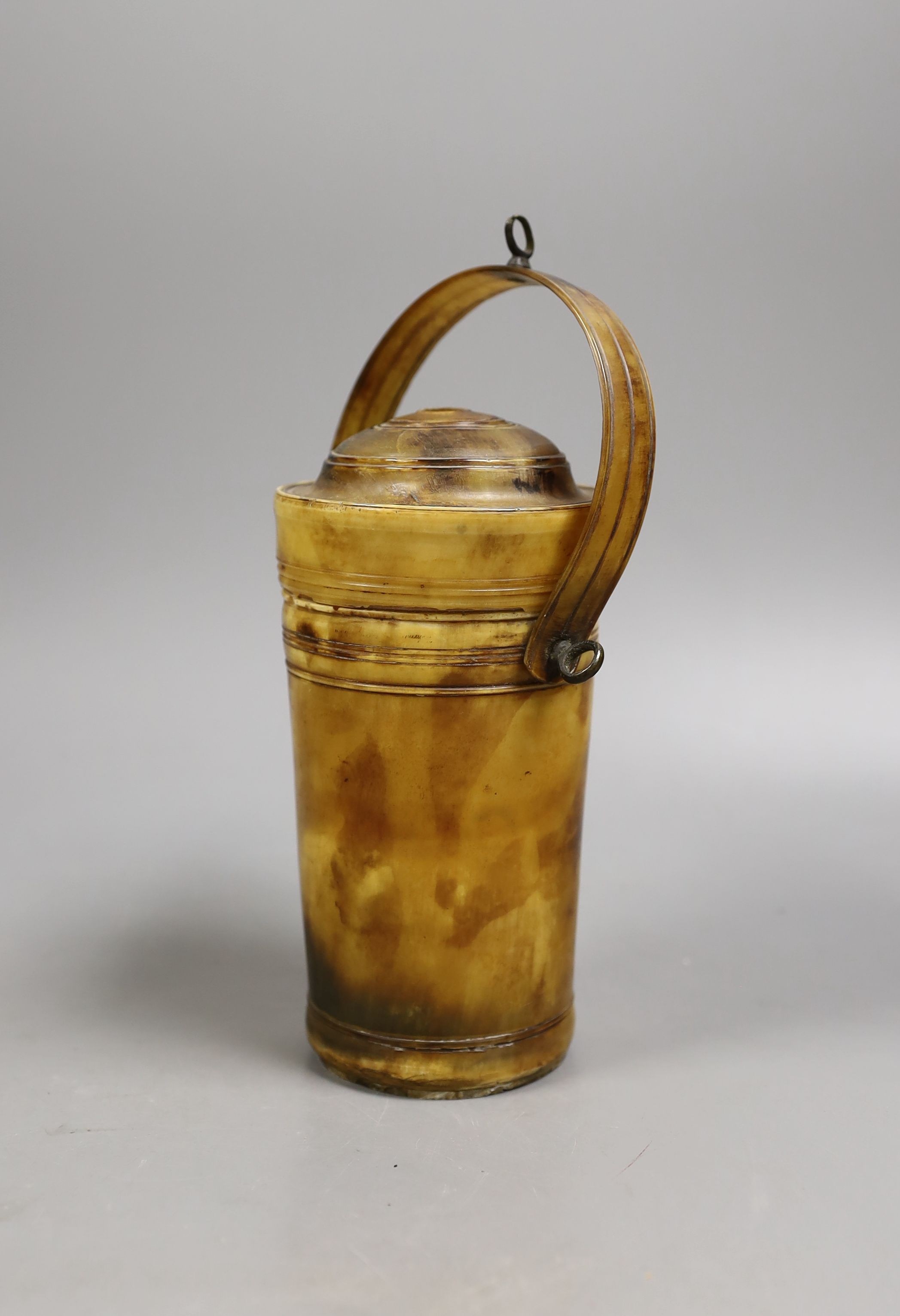 A 19th century horn portable beaker, 23 cms high including handle.